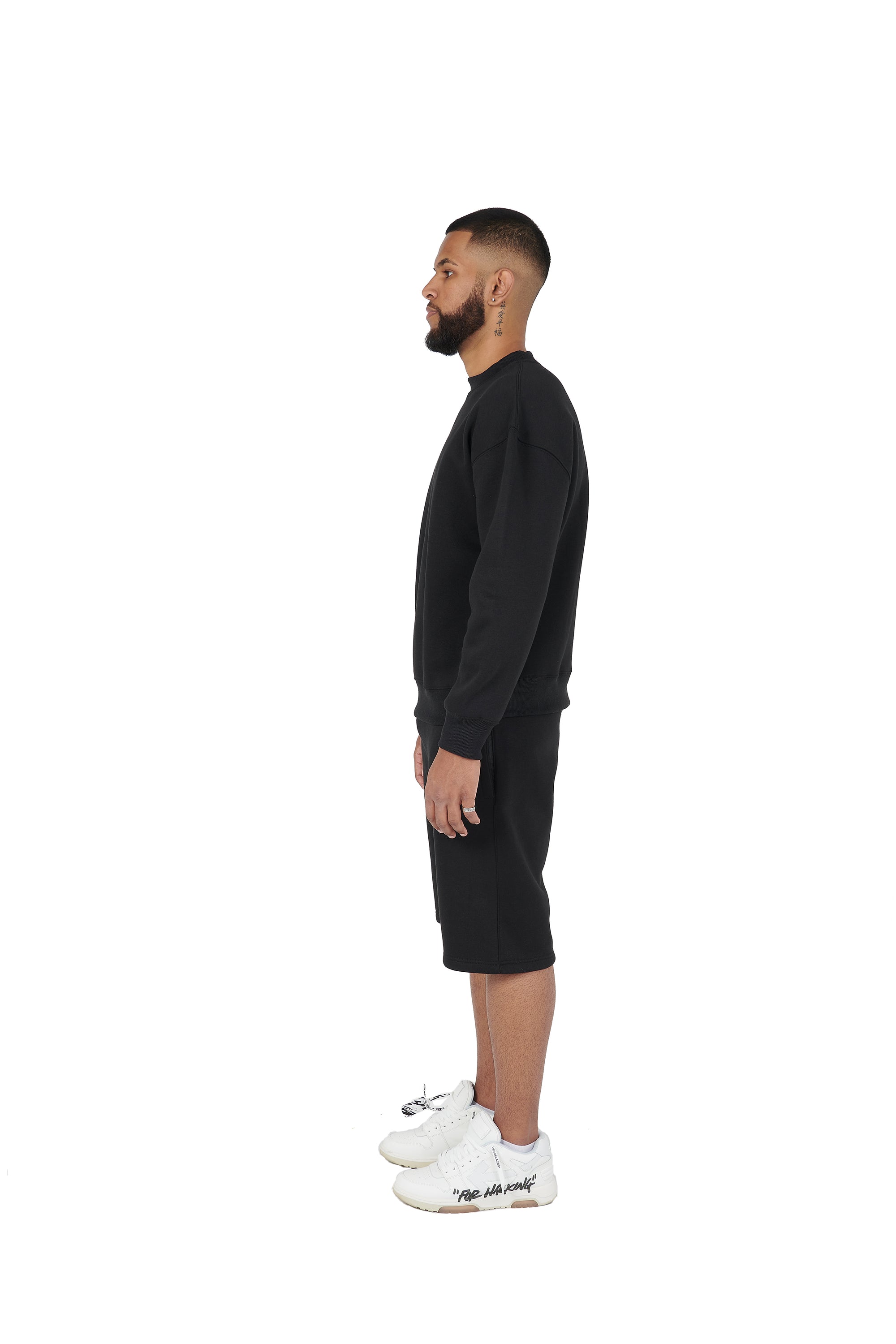 Wholesale Plain Black Over Sized Sweatshirt and Black Over Sized Shorts.