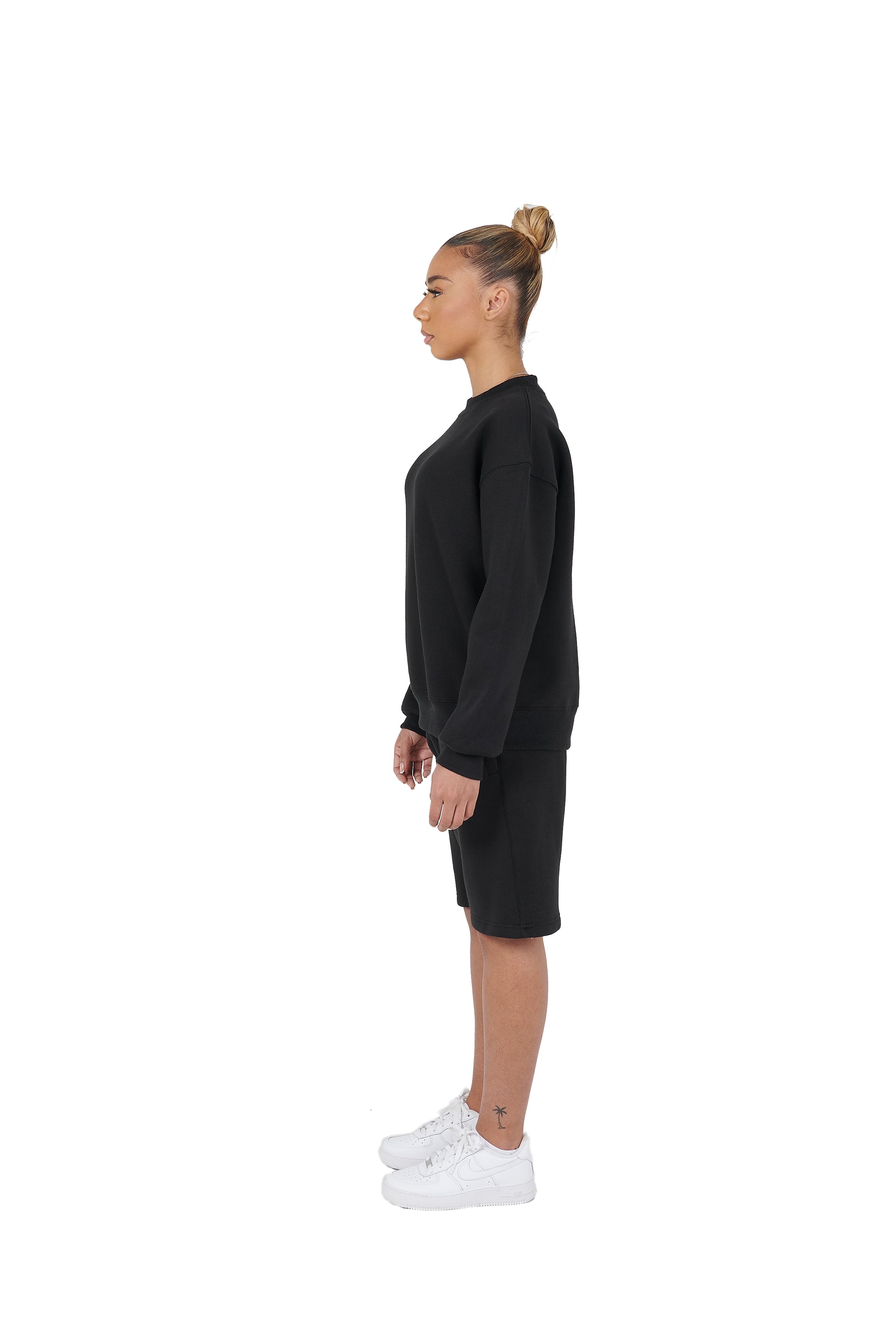 Wholesale Plain Black Over Sized Sweatshirt and Black Over Sized Shorts.