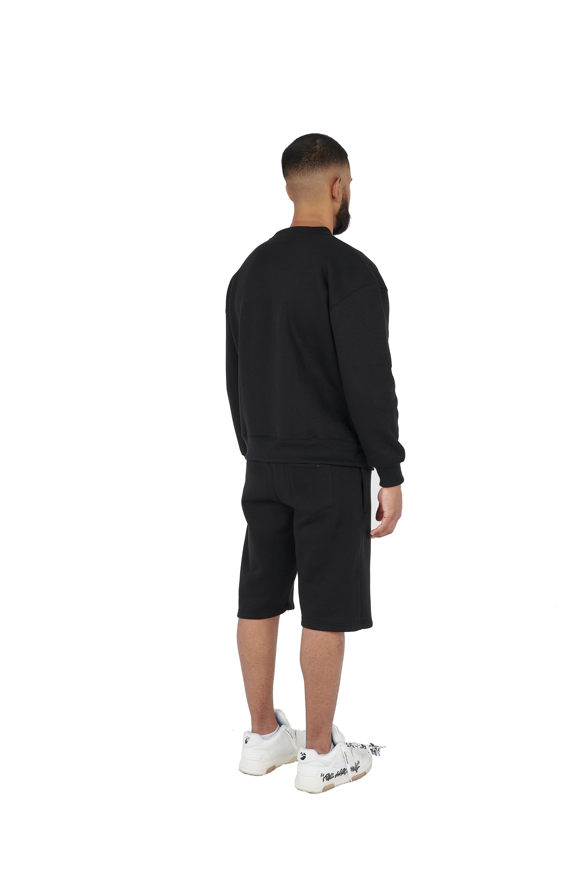 Wholesale Plain Black Over Sized Sweatshirt and Black Over Sized Shorts.